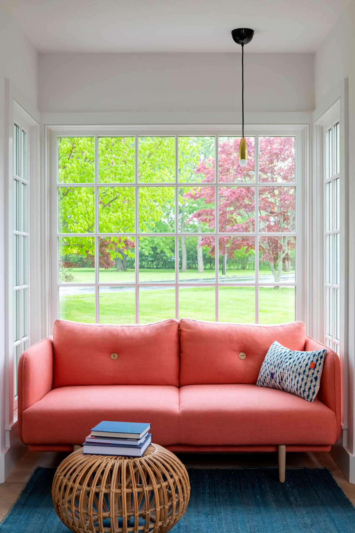Sunlit reading nook with garden view